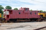 A caboose sits next to the Sequatchie Valley RR Office 